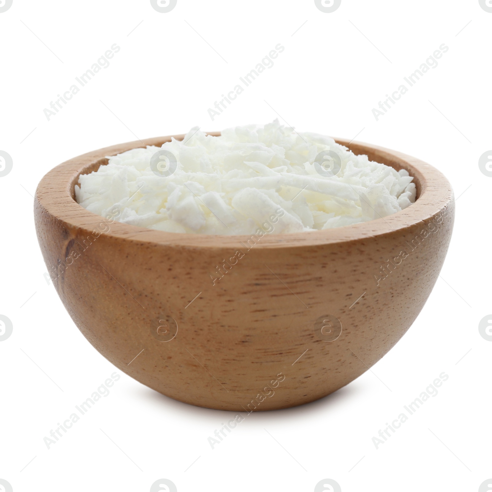 Photo of Soy wax in wooden bowl isolated on white