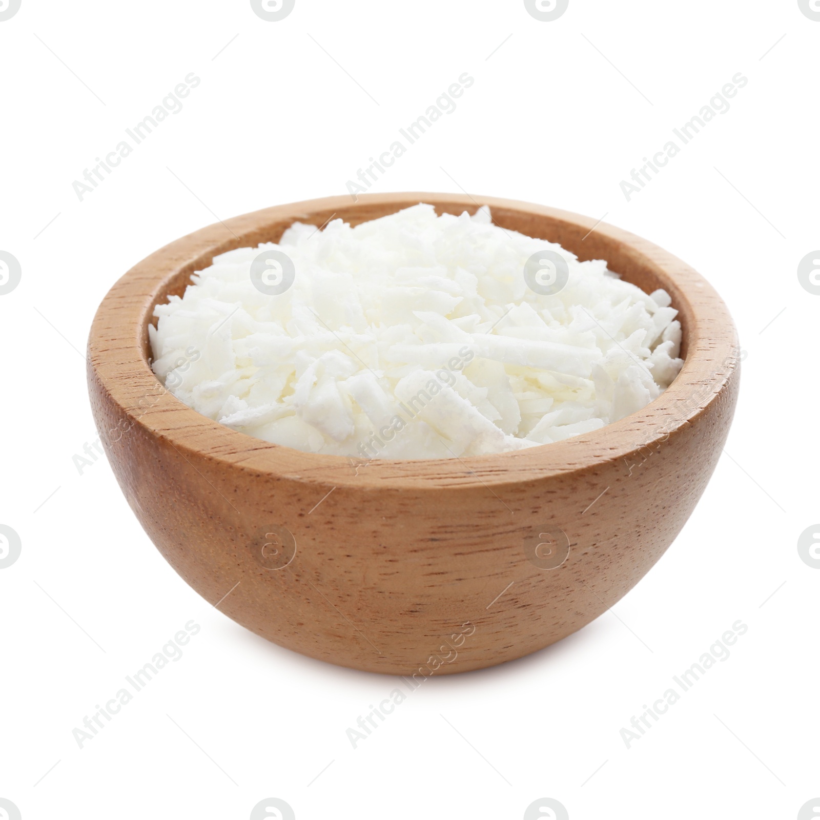 Photo of Soy wax in wooden bowl isolated on white