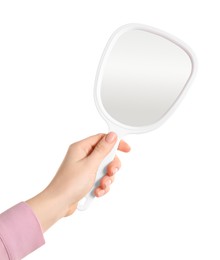 Photo of Woman holding small mirror on white background, closeup