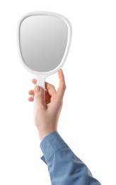 Photo of Woman holding small mirror on white background, closeup