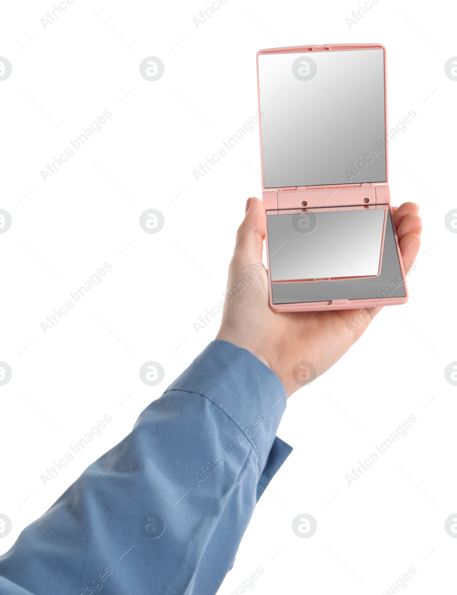 Photo of Woman holding pocket mirror on white background, closeup