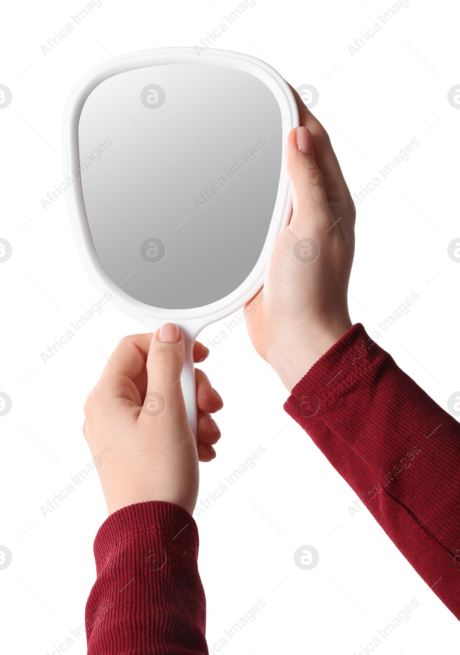 Photo of Woman holding small mirror on white background, closeup