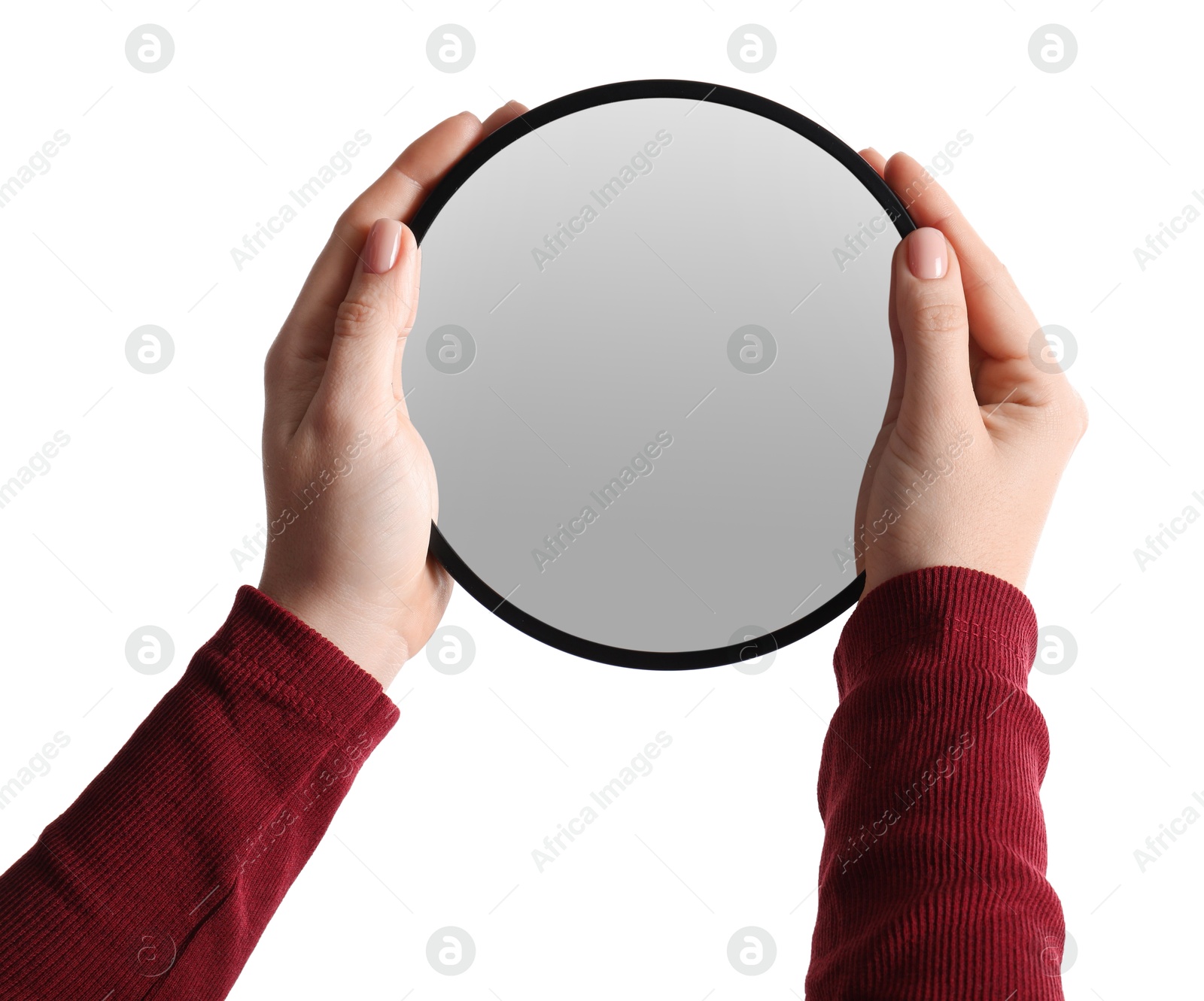 Photo of Woman holding round mirror on white background, closeup