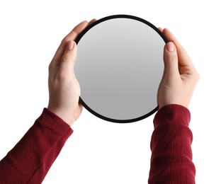 Woman holding round mirror on white background, closeup