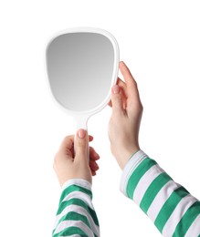 Woman holding small mirror on white background, closeup