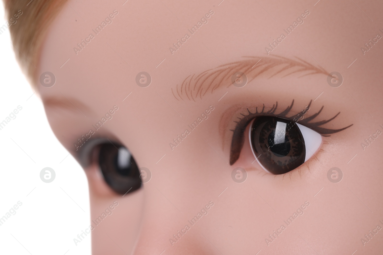 Photo of Beautiful doll on white background, closeup view