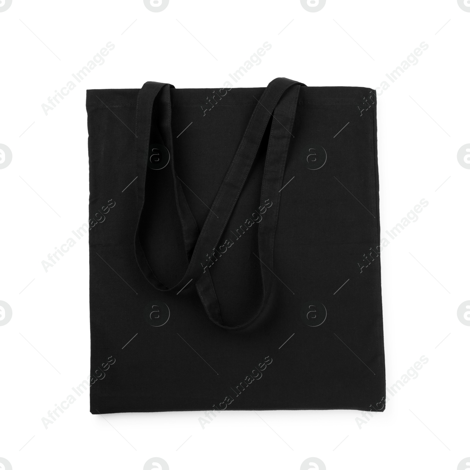 Photo of One black shopping bag isolated on white. Mockup for design