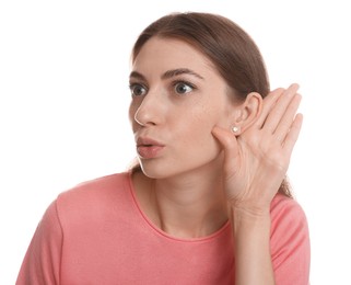 Photo of Woman showing hand to ear gesture on white background