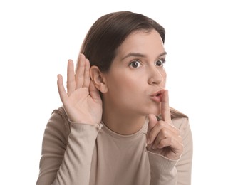 Photo of Woman showing hand to ear gesture on white background