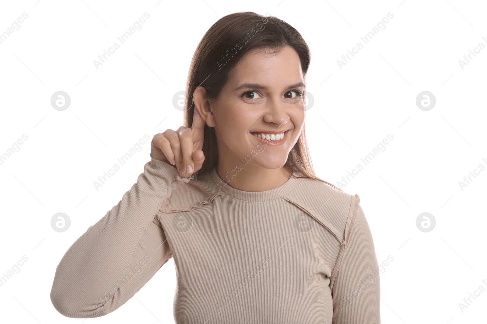 Photo of Woman showing hand to ear gesture on white background