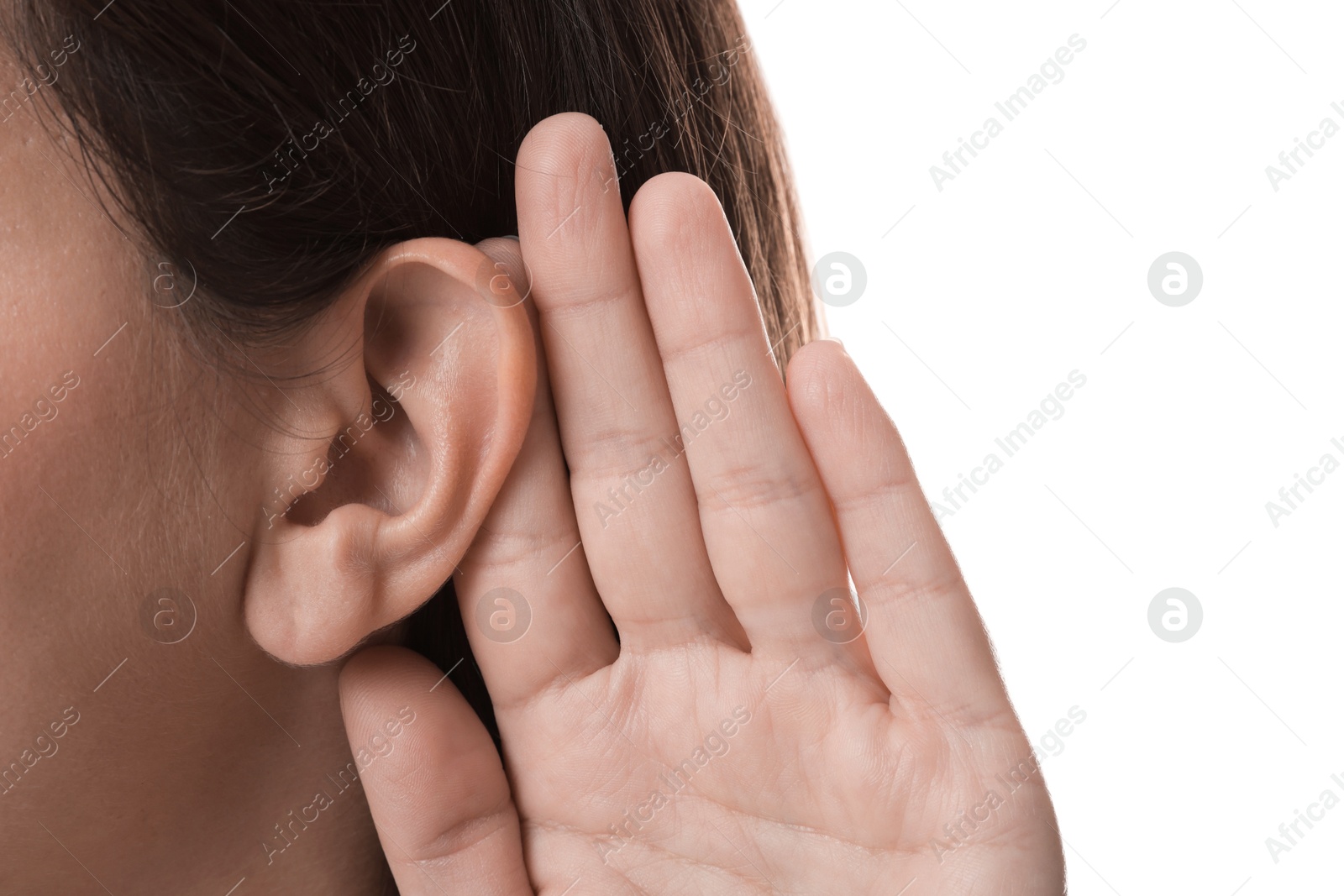 Photo of Woman showing hand to ear gesture on white background, closeup