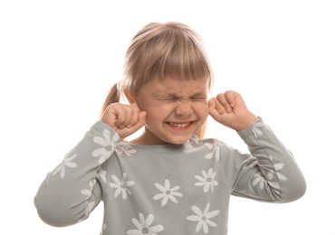 Photo of Little girl covering her ears with fingers on white background