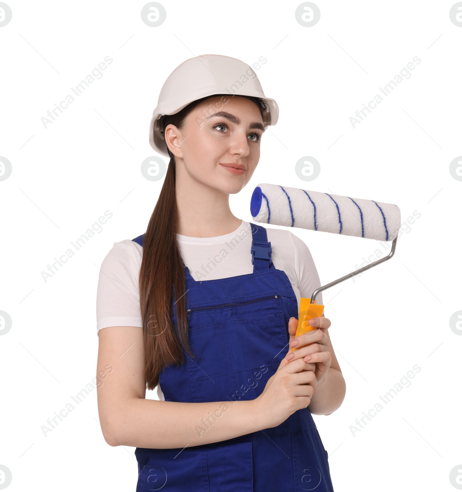 Photo of Portrait of young decorator with paint roller on white background