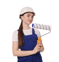 Photo of Portrait of young decorator with paint roller on white background