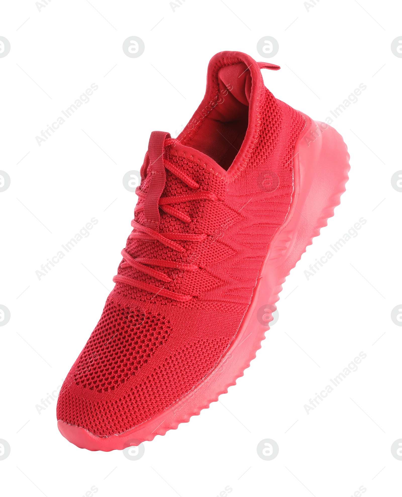 Photo of One stylish red sneaker isolated on white