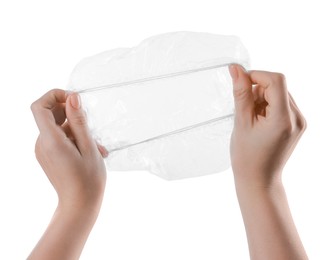 Photo of Woman with shower cap on white background, closeup