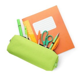 Photo of Copybook and other school stationery on white background, top view