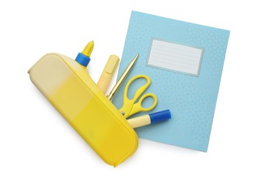 Photo of Copybook and other school stationery on white background, top view