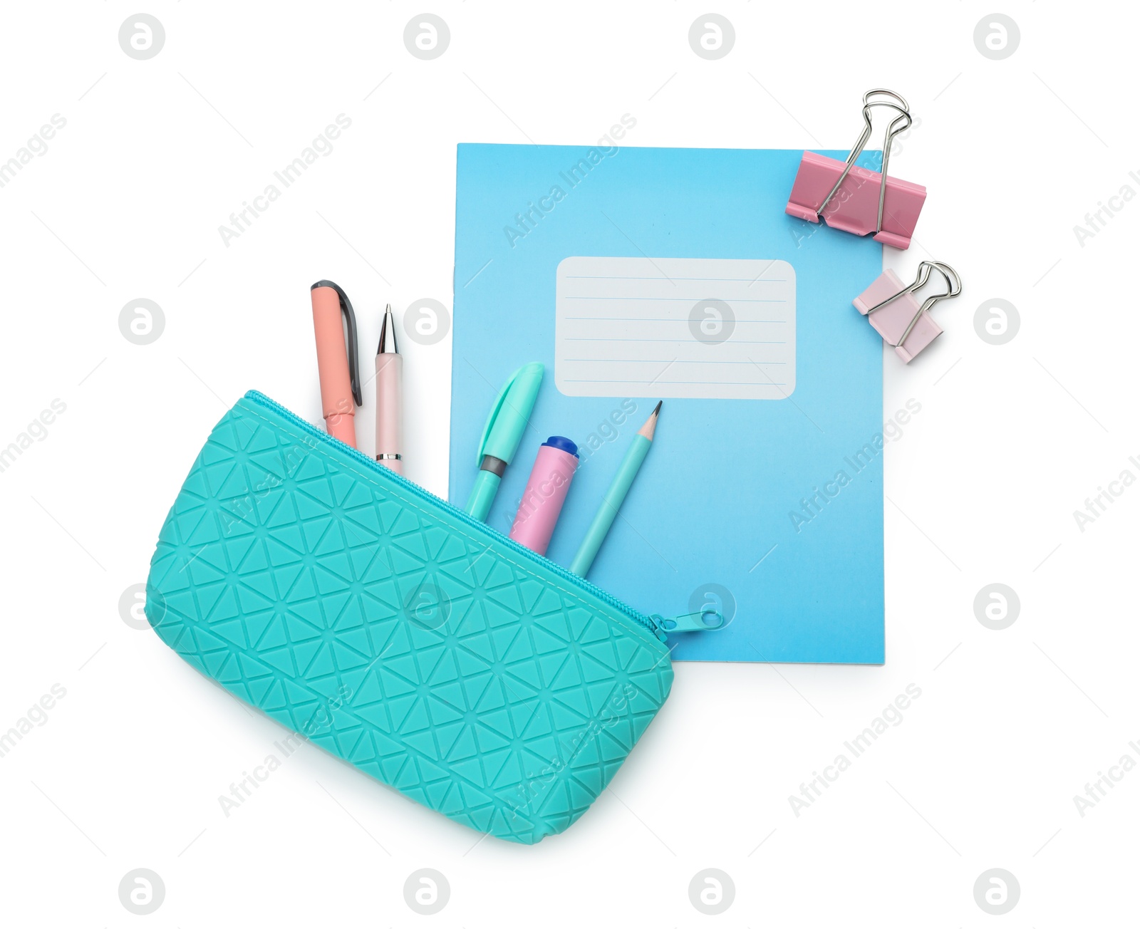 Photo of Copybook and other school stationery on white background, top view