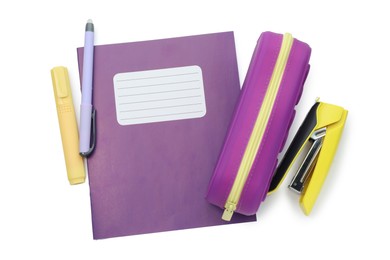 Photo of Copybook and other school stationery on white background, top view