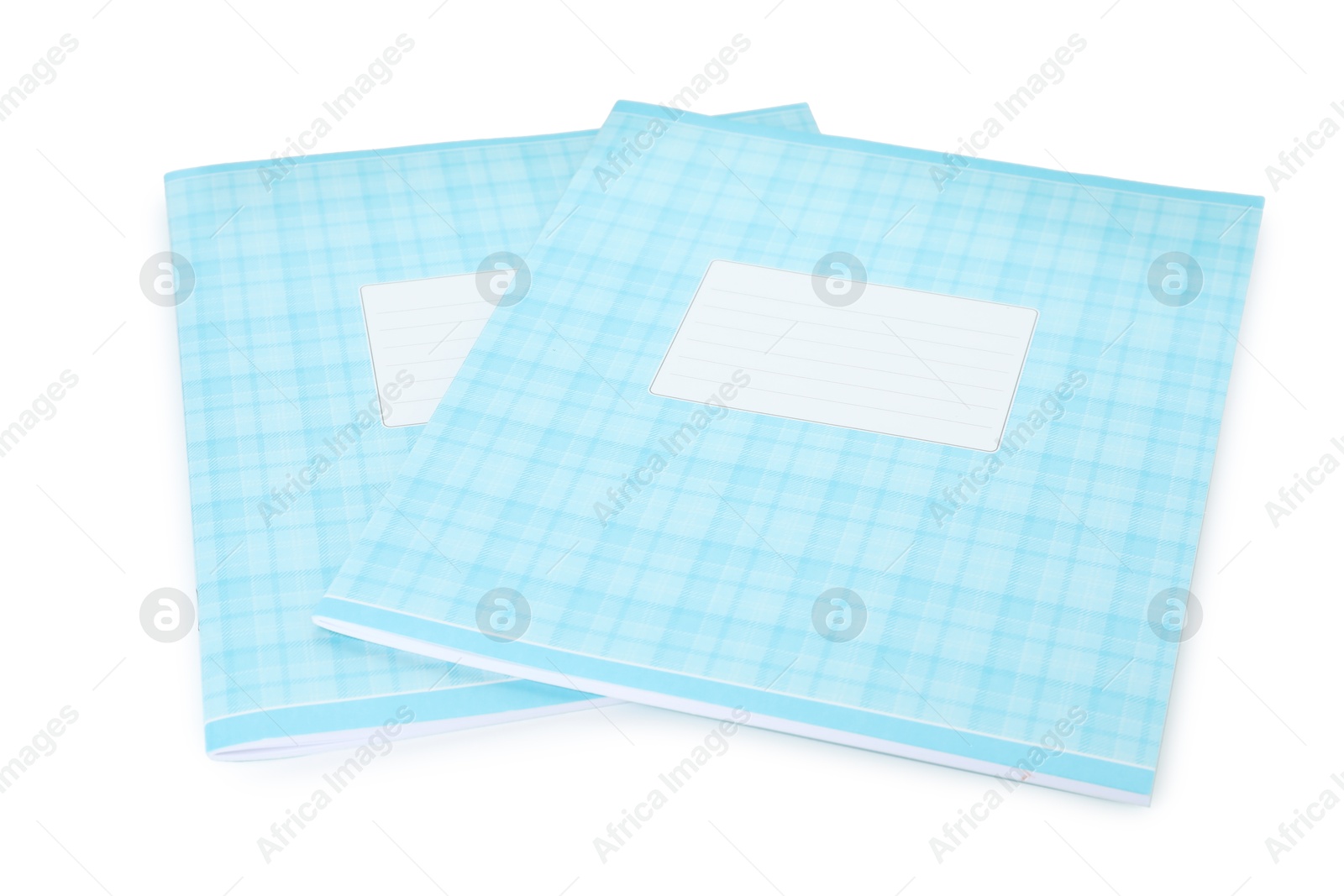 Photo of Two copybooks isolated on white. School stationery