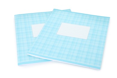 Photo of Two copybooks isolated on white. School stationery