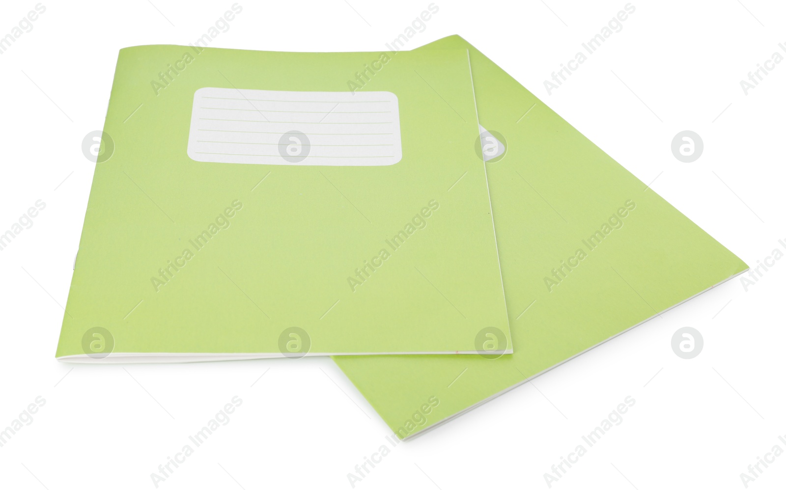 Photo of Light green copybooks isolated on white. School stationery