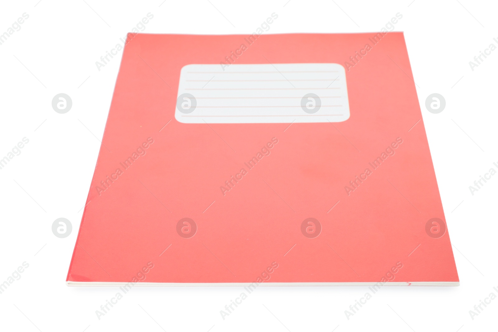 Photo of One red copybook isolated on white. School stationery