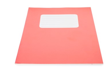 Photo of One red copybook isolated on white. School stationery