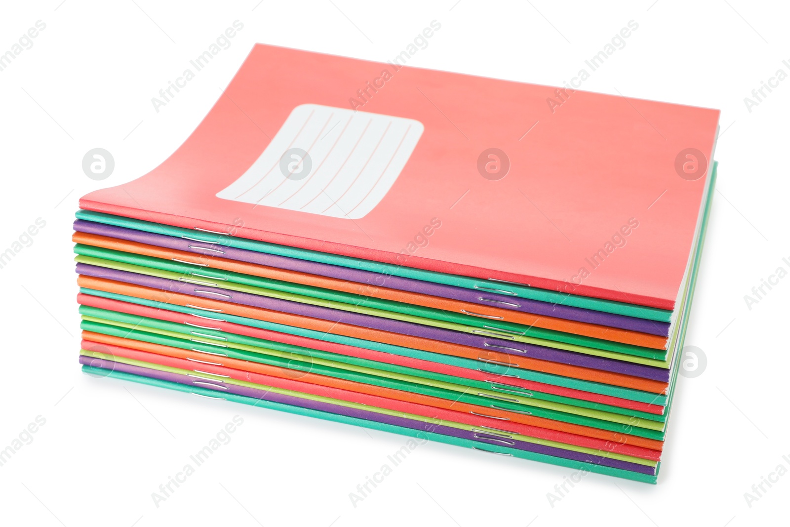 Photo of Stack of colorful copybooks isolated on white