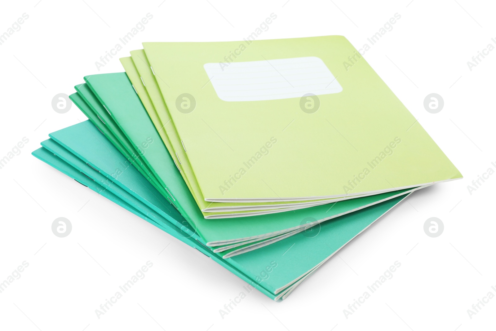 Photo of Colorful copybooks isolated on white. School stationery