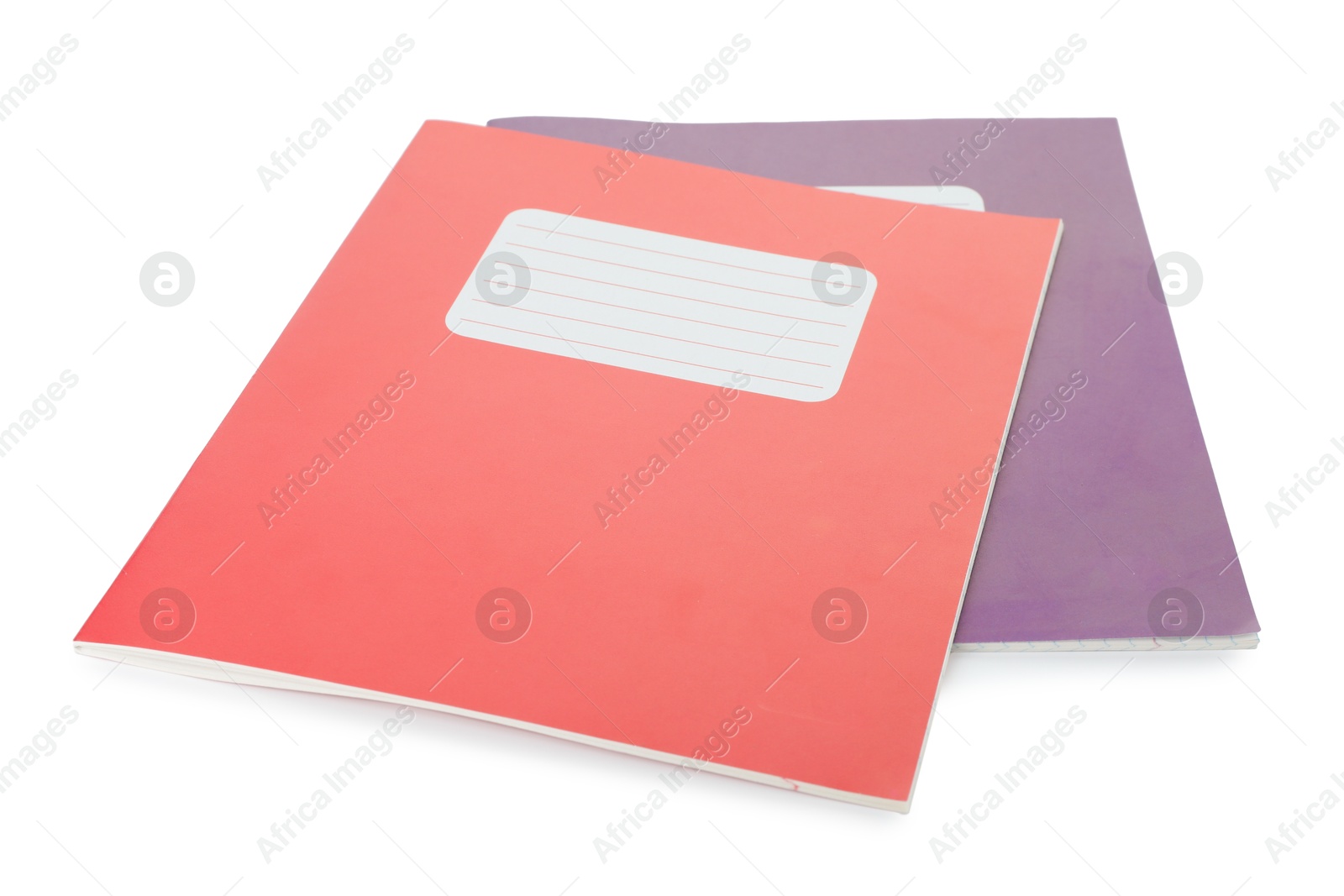 Photo of Red and purple copybooks isolated on white