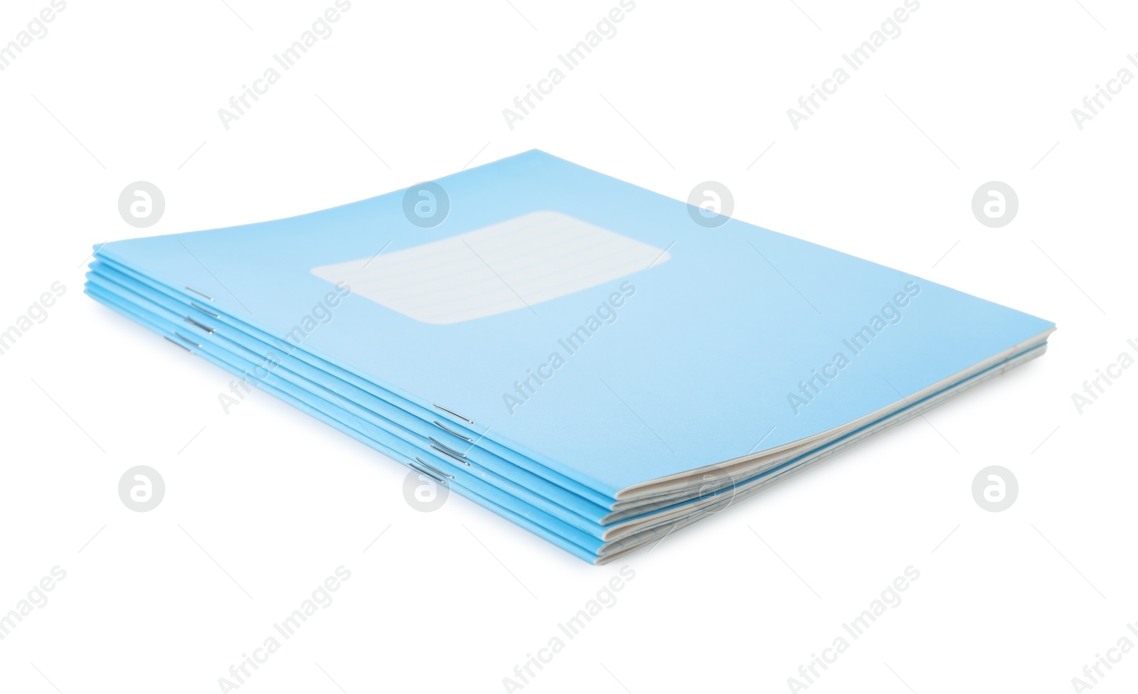 Photo of Stack of light blue copybooks isolated on white