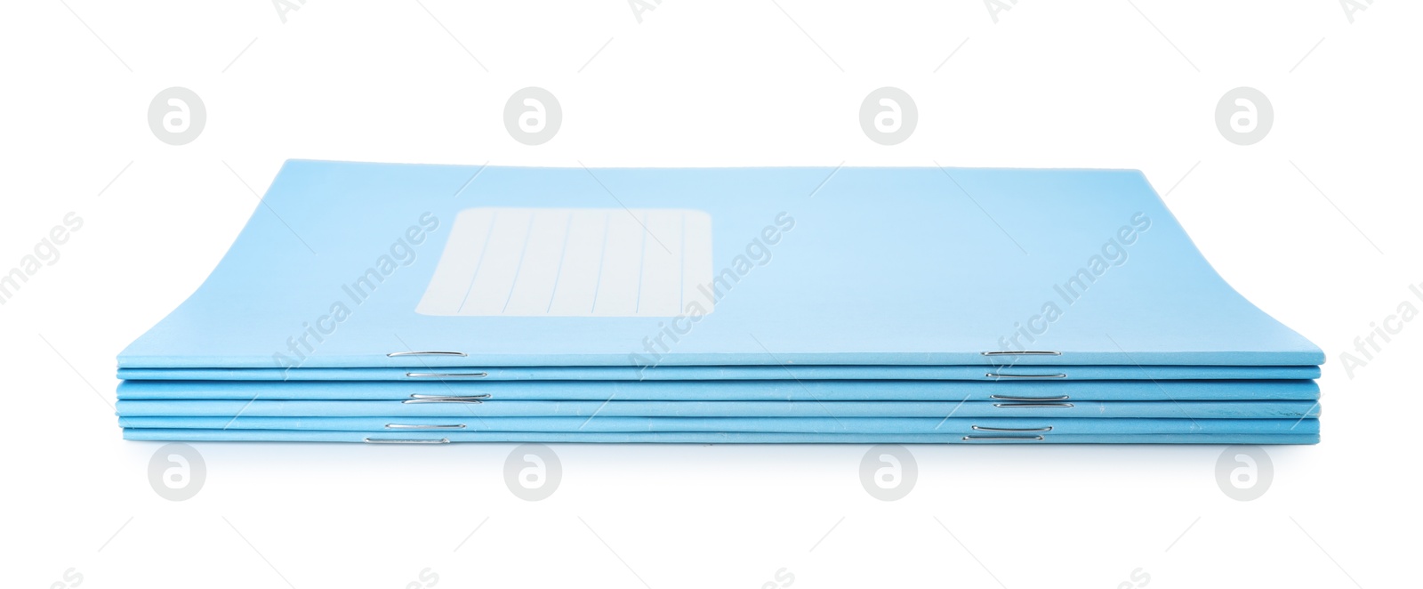 Photo of Stack of light blue copybooks isolated on white. School stationery