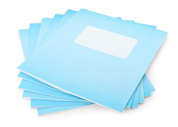 Photo of Light blue copybooks isolated on white. School stationery