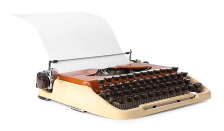 Photo of Vintage typewriter with sheet of paper isolated on white