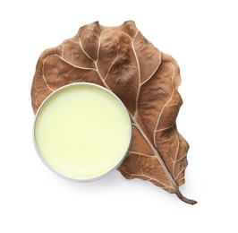 Photo of Natural solid perfume and dry leaf isolated on white, top view