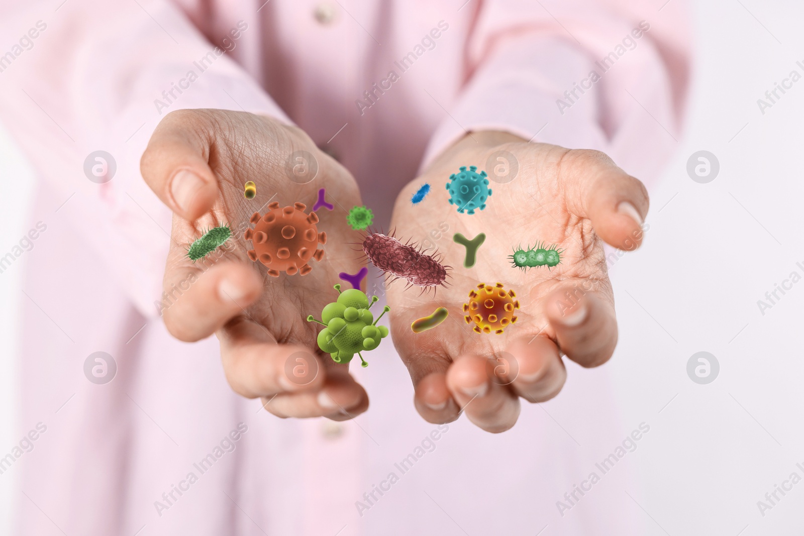 Image of Man showing hands with microbes on white background, closeup. Illustration of microorganisms