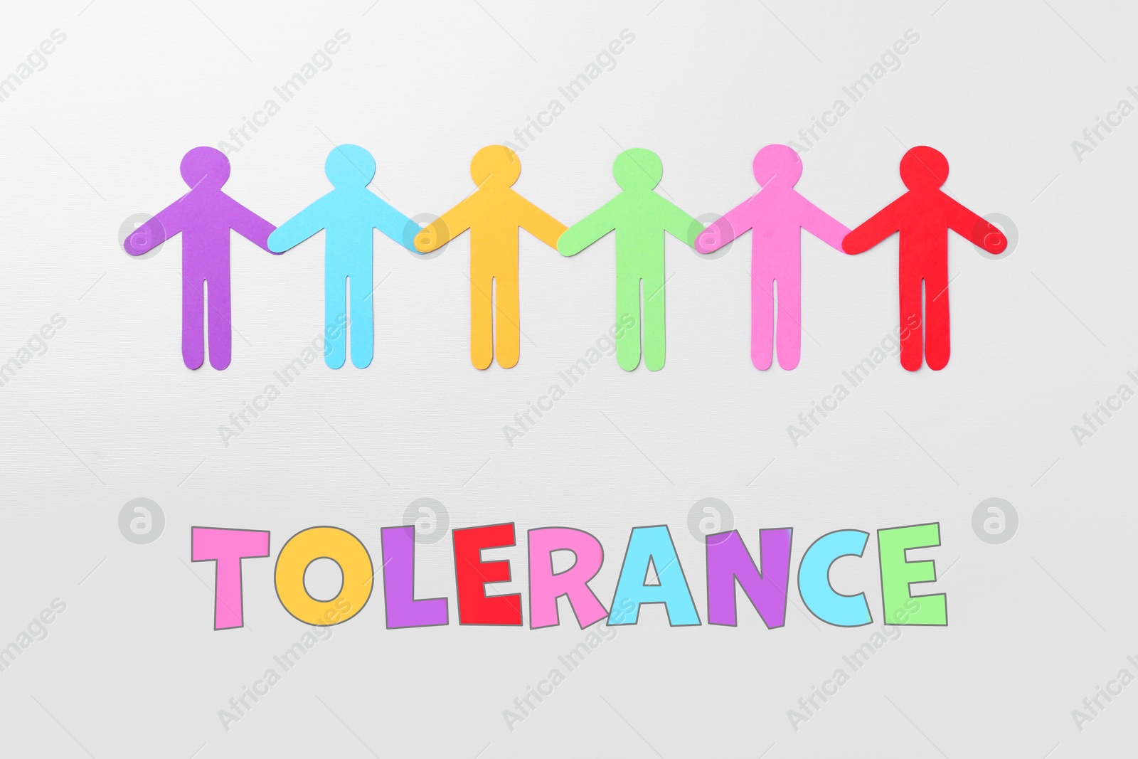 Image of Tolerance concept. Paper human figures on light background, top view