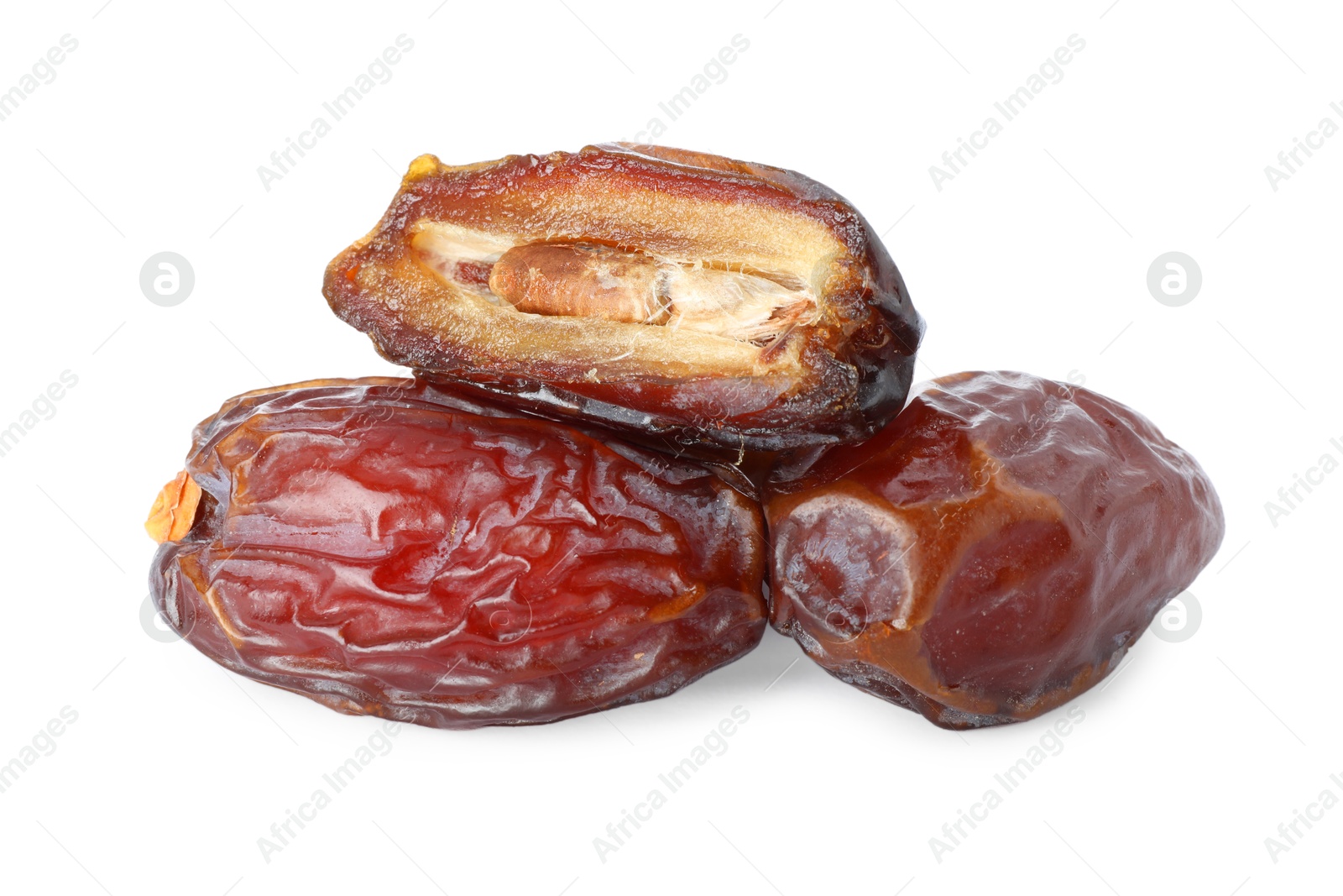 Photo of Three tasty dried dates isolated on white