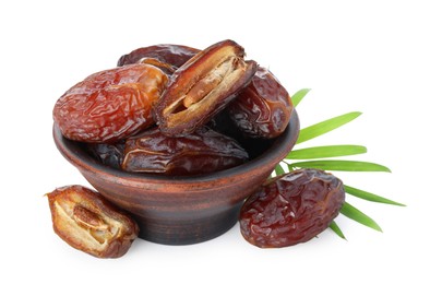 Photo of Tasty dried dates and leaf in bowl isolated on white