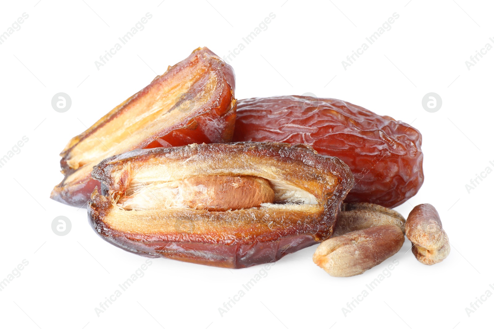 Photo of Tasty dried dates and seeds isolated on white