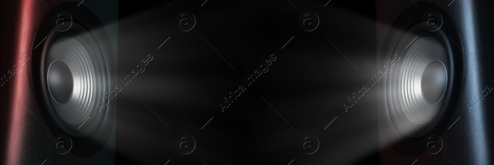 Image of Light rays coming out of sound speakers on black background, banner design