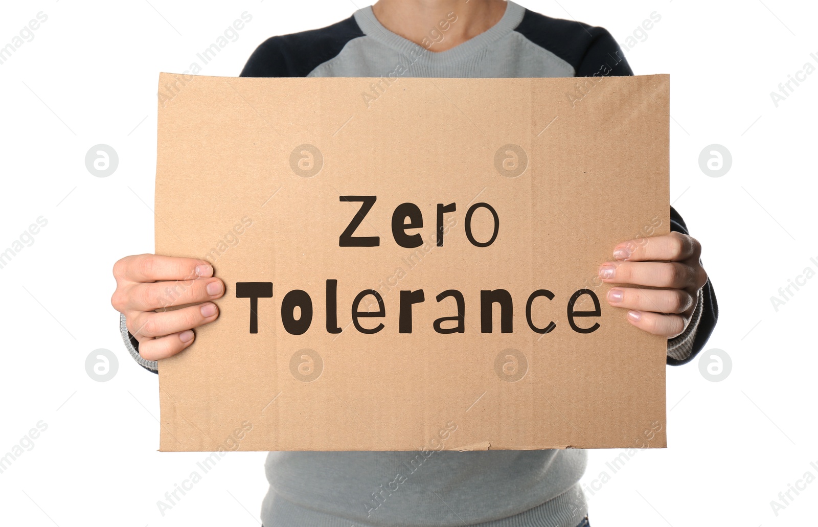 Image of Woman holding piece of cardboard with words Zero Tolerance on white background, closeup