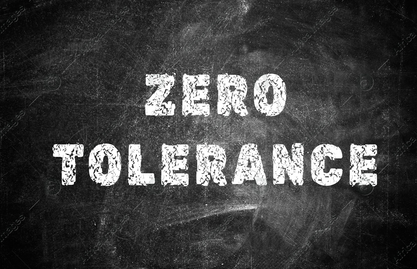 Image of Zero Tolerance concept. Words on black chalkboard