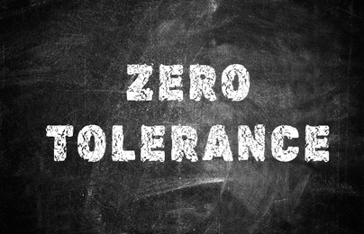 Zero Tolerance concept. Words on black chalkboard