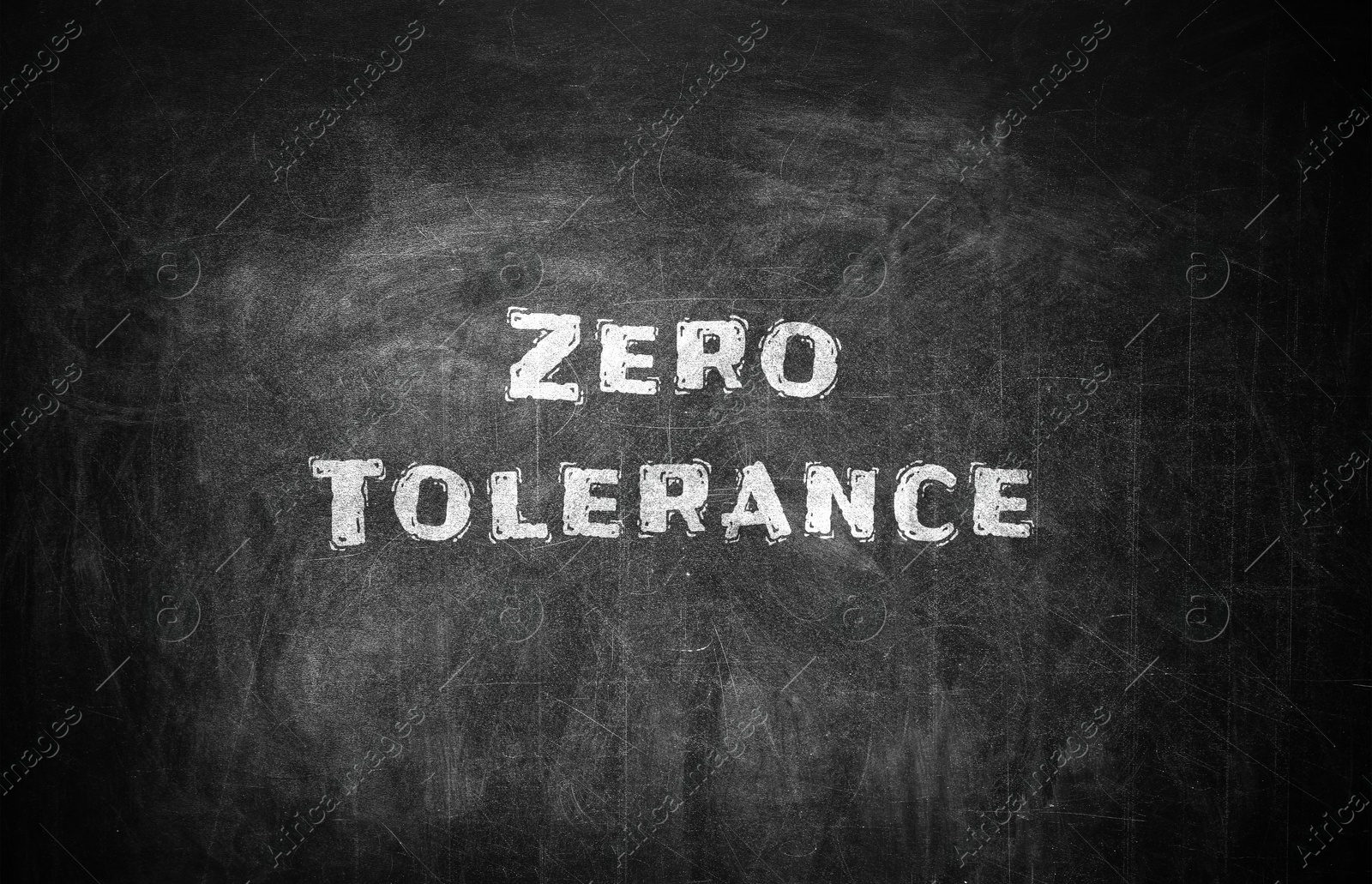 Image of Zero Tolerance concept. Words on black chalkboard