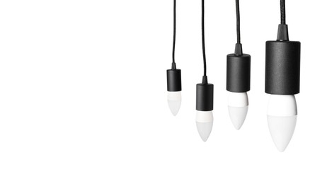 Image of Light bulbs hanging on white background. Banner design with space for text