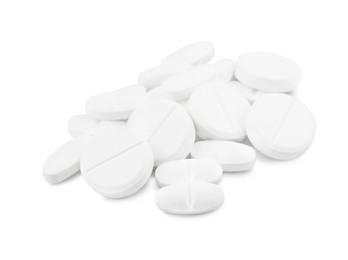 Photo of Pile of antibiotic pills on light grey background, closeup