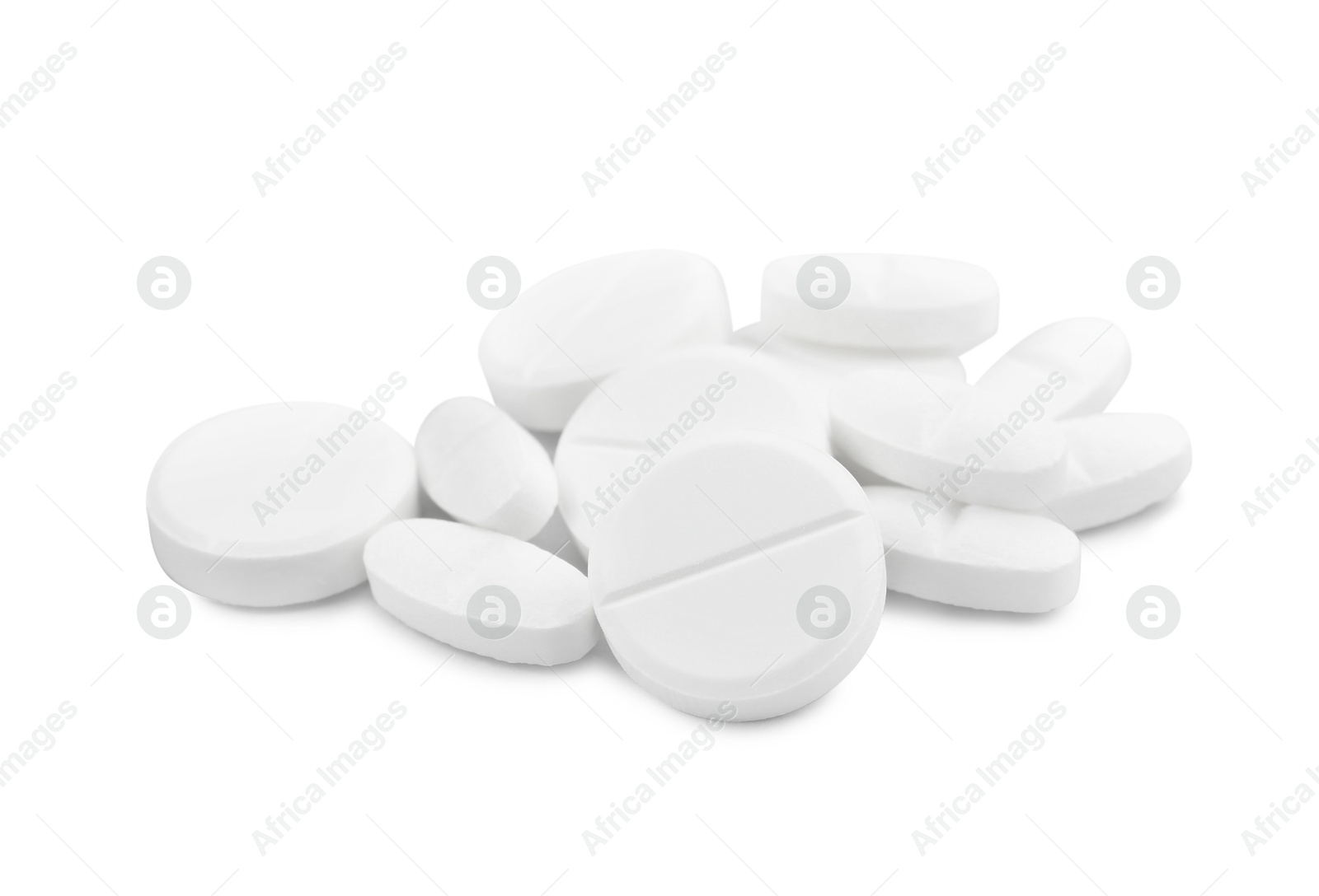 Photo of Pile of antibiotic pills on light grey background, closeup